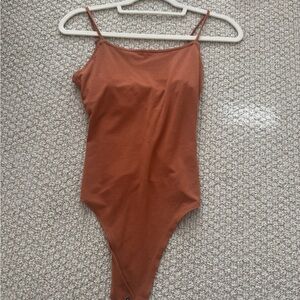 American Eagle Women’s One Piece Bodysuit in Rust